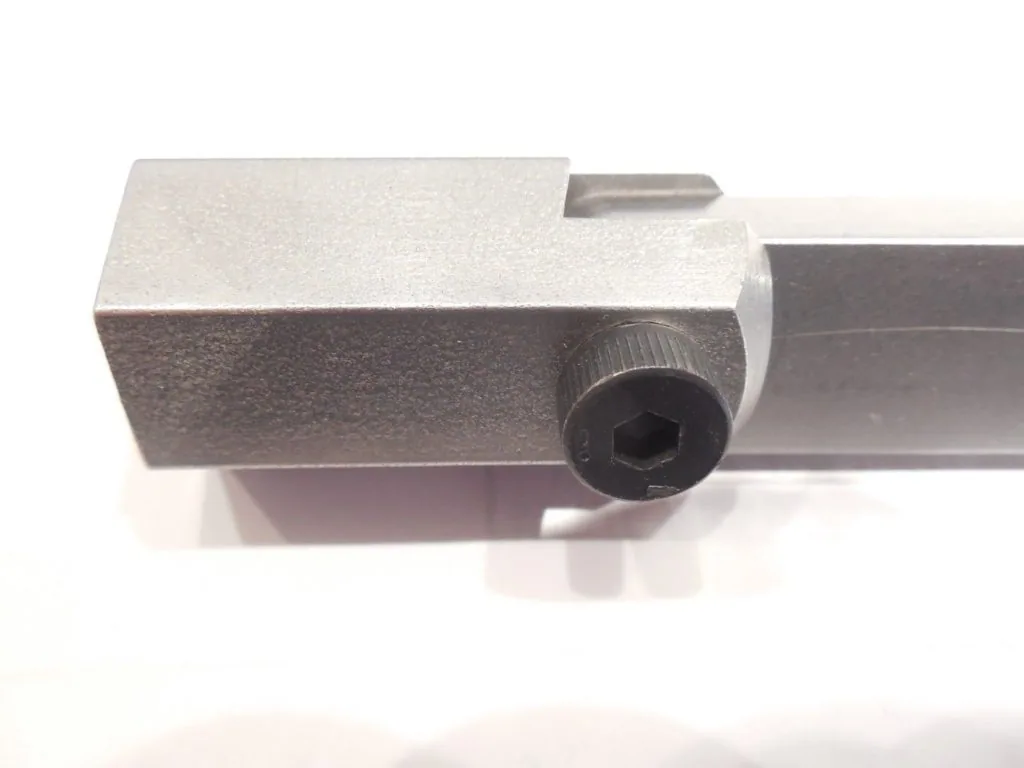Metal lathe tool holder with hexagonal socket connection and textured finish