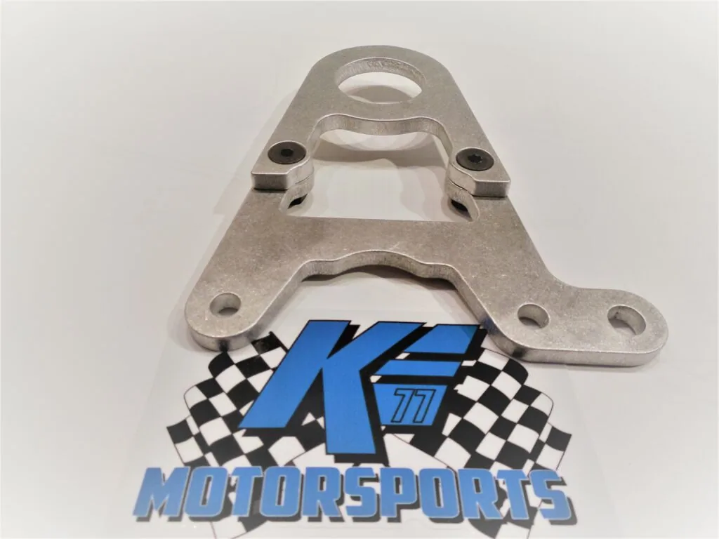 Metal engine bracket with multiple bolt holes and mounting points for automotive use